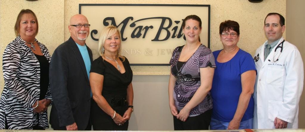 From left, MVH Director of Medical Records Lauren Altemera, RHIA, of Rostraver Township, with Rostraver residents Bill and Linda Horrell, owners of MarBill Diamonds & Jewelry in Belle Vernon, who are supporting Monongahela Valley Hospital’s free Breast Cancer Education Screening and Luncheon Wednesday, Oct. 30 at 1 p.m. at the hospital. Also with them are Jamie Fedorchak, RN, of Fallowfield Township, Nurse Manager of 7-East Oncology; MVH Assistant Director of Medical Records Angel Swab, of Smithton, and Andrew J. Zahalsky, M.D., of Venetia, MVH director of Medical Oncology.