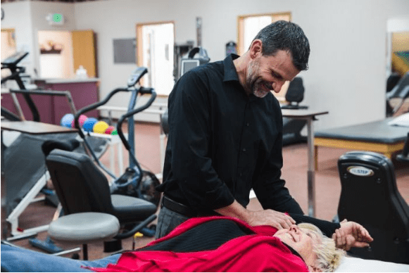 Physical Therapist Helping Patient